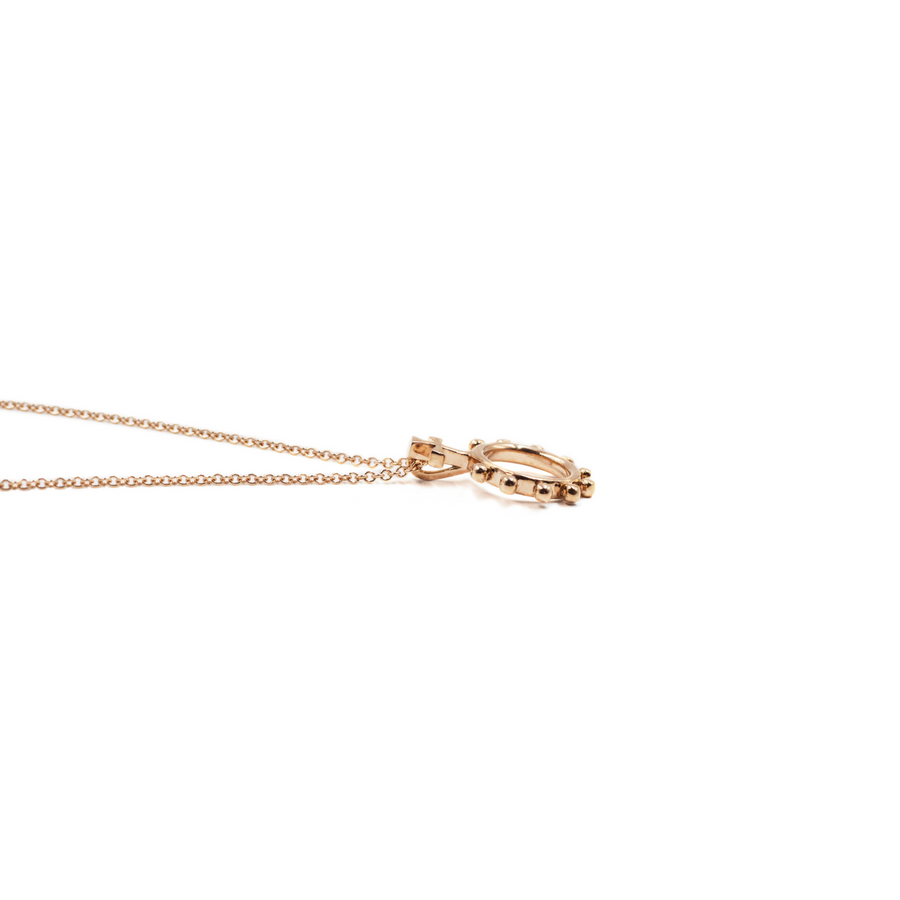 Side view of a Rosary Ring Necklace in Rose Gold